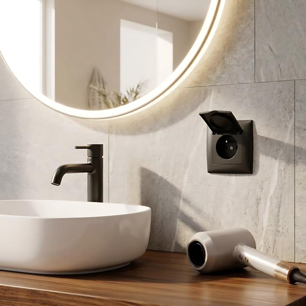 Vienvietīga rozete ar zemējumu un vāciņu OSTE JNH005-G Black