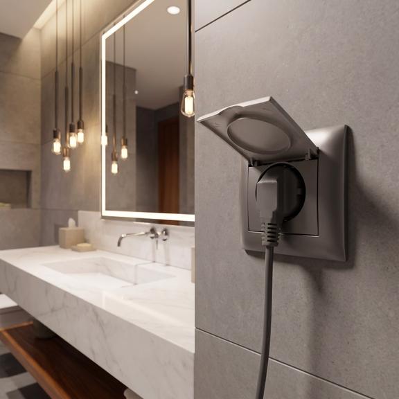 Единичен контакт със заземяване и капаче с рамка OSTE JNH005-G Grey